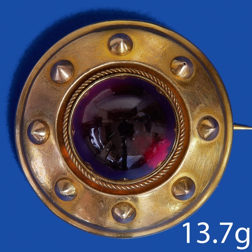 159 - VICTORIAN GARNET BROOCH 
13.7 grams testing 15 ct. gold. 
locket back 
3.7 cm diameter