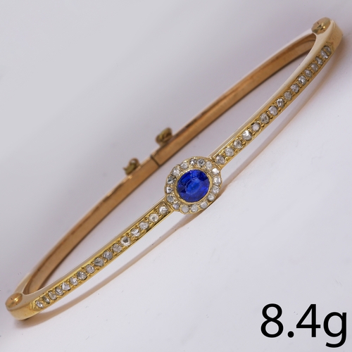 185 - SAPPHIRE AND DIAMOND CLUSTER HINGED BANGLE,
8.4 grams, testing high carat gold.
Inner diam. 5.5 cm.