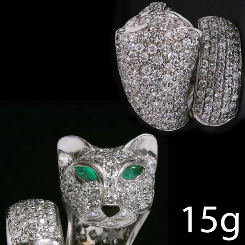 26 - DIAMOND AND EMERALD PANTHER RING.
15 grams, 18 ct. gold.
Diamonds bright and lively, totalling appro... 