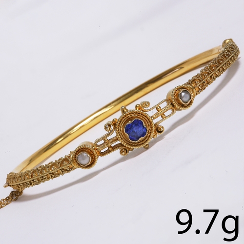 177 - VICTORIAN ETRUSCAN REVIVAL SAPPHIRE AND PEARL HINGED BANGLE,
9.7 grams, Testing high carat gold.
Fin... 