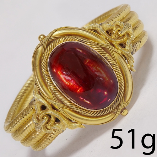 129 - LARGE VICTORIAN GARNET BRACELET,
51 grams, high carat gold.
The center with a large vibrant cabochon... 