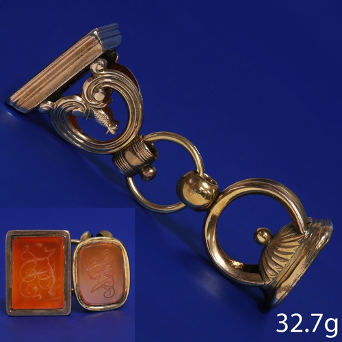 154 - TWO ANTIQUE GOLD FOB SEALS ON RING.
32.7 grams. Testing high carat gold.
H. 3.4 and 3.4 mm.