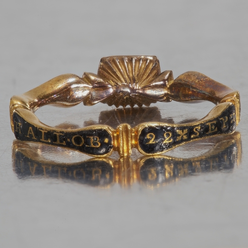 6 - GEORGIAN ENAMEL AND SKULL MINIATURE  MEMORIAL RING, 1731.
The shank with text and dated 1731.
A skul... 