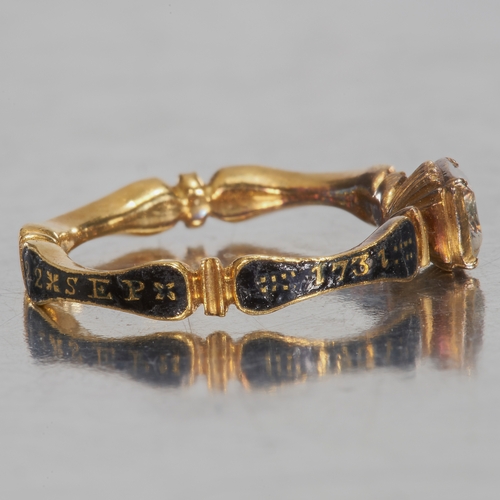 6 - GEORGIAN ENAMEL AND SKULL MINIATURE  MEMORIAL RING, 1731.
The shank with text and dated 1731.
A skul... 