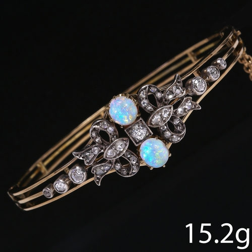 113 - VICTORIAN OPAL AND DIAMOND BANGLE,
15,2 grams, testing high carat gold and silver.
Lovely bright and... 