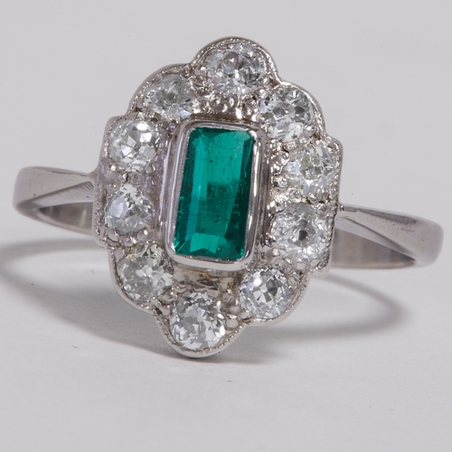 114 - ART DECO EMERALD AND DIAMOND CLUSTER RING 
2.9 grams 18 ct. and platinum 
rich vibrant emerald 
brig... 