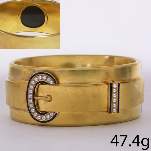 2 - VICTORIAN ENAMEL AND PEARL BUCKLE CUFF HINGED BANGLE,
47.4 grams, testing high carat gold.
The top i... 