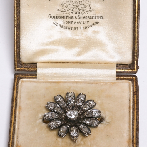 48 - VICTORIAN DIAMOND FLOWER BROOCH 
5.7 grams 
bright lively old cut diamonds 
L 2.4 cm 
fitted box