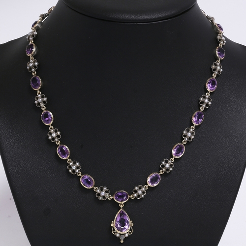 143 - ANTIQUE AMETHYST AND PEARL NECKLACE,
35.9 grams, High carat gold and silver.
Vibrant amethyst open b... 