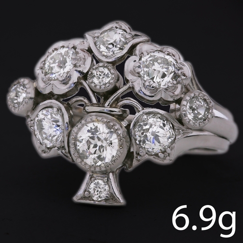 42 - DIAMOND GIARDINETTO RING,
6.9 grams, Platinum.
Diamonds totalling approx. 1.90 ct. H-J colour, VS/SI... 