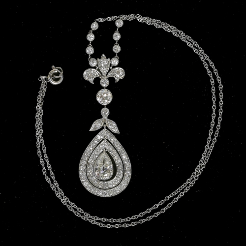 32 - EDWARDIAN DIAMOND PENDANT NECKLACE,
7.5 grams, testing high carat gold.
Larger pear shaped diamond o... 