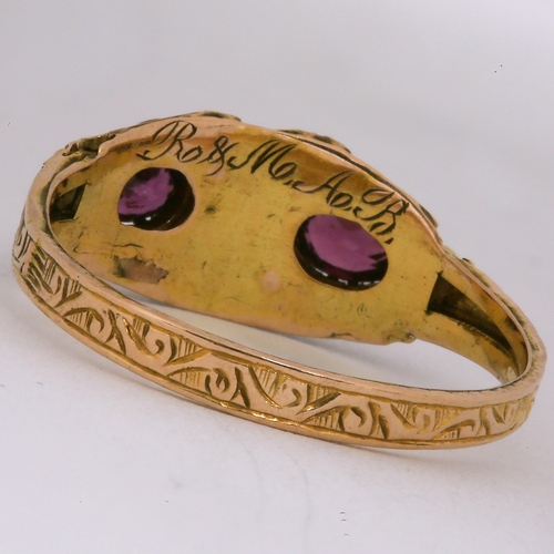 64 - VICTORIAN GARNET AND DIAMOND RING,
15 ct. gold.
Vibrant garnets.
Diamonds bright and lively.
Size P.