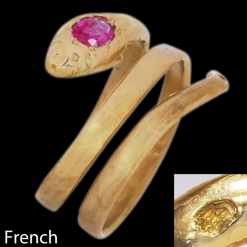 33 - FRENCH RUBY SNAKE RING,
3.4 grams, 18 ct. gold, French.
Vibrant ruby.
Size O.