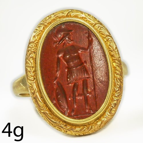 97 - FINE INTAGLIO RING,
4.7 grams, testing high carat gold.
The carved hardstone cameo depicting a warri... 