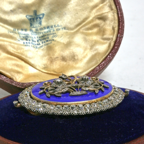 103 - RARE LARGE GEORGIAN DIAMOND AND ENAMEL BROOCH,
32.8 grams, high carat gold.
The blue enamel centre w... 