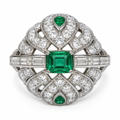 105 - EMERALD AND DIAMOND CLUSTER RING,
8.9 grams, testing high carat gold.
Rich and vibrant emeralds tota... 
