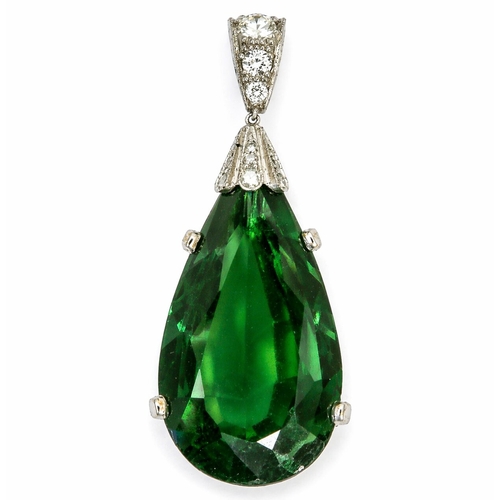 114 - FINE TOURMALINE AND DIAMOND PENDANT,
8..3 grams, testing high carat gold.
Large pear shaped green to... 