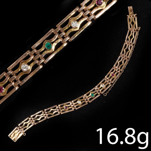 119 - VINTAGE DIAMOND, RUBY AND EMERALD GATE LINK BRACELET 
16.9 grams, testing 15 ct. gold. 
Vibrant rubi... 