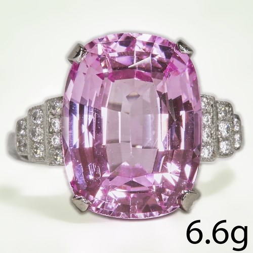 63 - KUNZITE AND DIAMOND RING,
6 grams, testing high carat gold.
Rich and vibrant kunzite of approx. 6.60... 