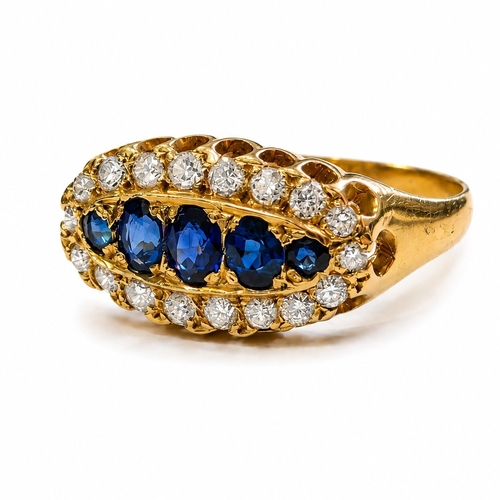 75 - SAPPHIRE AND DIAMOND RING,
18 ct. gold.
Rich and vibrant sapphires.
Diamonds bright and lively.
Size... 