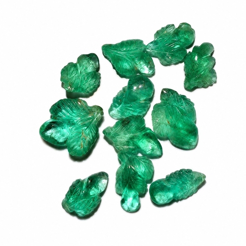 85 - LOT OF CARVED EMERALDS, TOTALLING APPROX. 9.90 CT.