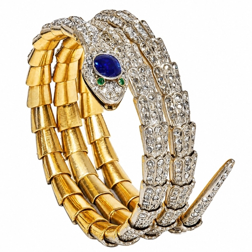 93 - IMPORTANT VICTORIAN DIAMOND AND SAPPHIRE SPRING SNAKE BANGLE,
62,4 grams.
The snake of 3 coil design... 