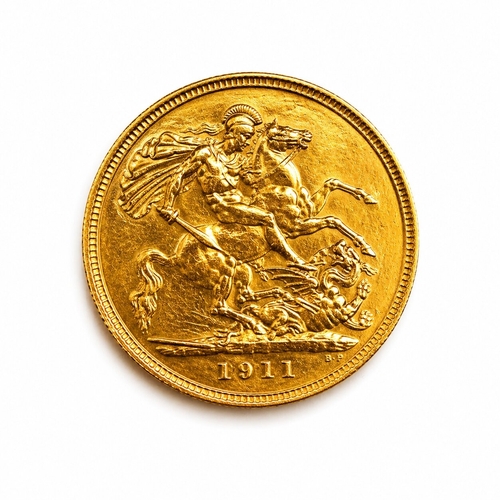96 - 1911 GOLD HALF SOVEREIGN.
4.0 grams, 22ct gold. Bare head of George V left; reverse St George and dr... 