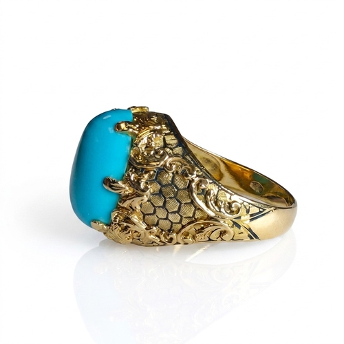 33 - TURQUOISE AND ENAMEL SOLITAIRE RING,
5.3 grams, testing 18 ct. gold.
Cabochon cut turquoise of appro... 