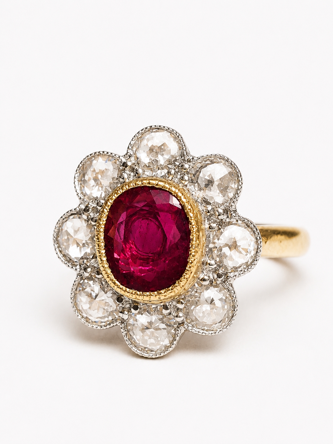 RUBY AND DIAMOND CLUSTER RING, 5,7 grams, 18 ct. gold. Rich and vibrant ...