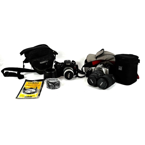 Two cameras, including a high quality Canon Eos 33V (circa 2004), 35mm ...