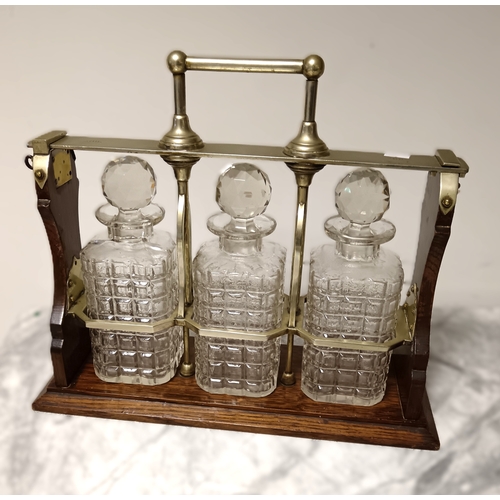 66 - A three decanter tantalus