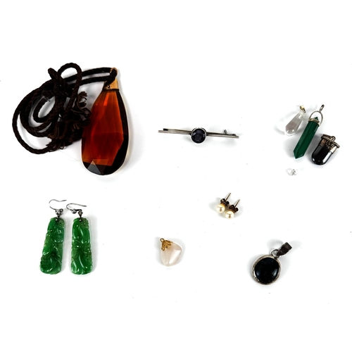 127 - A selection of assorted decorative jewellery, including a pair of Chinese carved 'jade' earrings; al... 