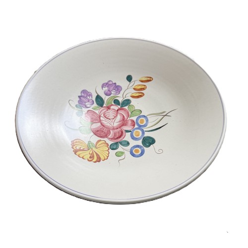 1 - A Poole Pottery set of six plates and one large serving bowl with floral motifs from the 