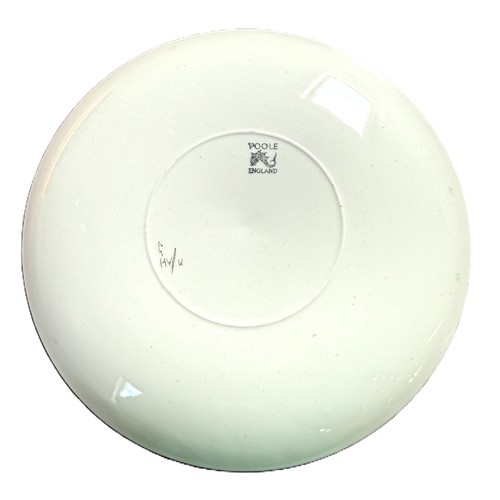 1 - A Poole Pottery set of six plates and one large serving bowl with floral motifs from the 