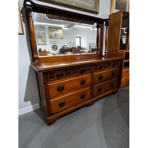 2 - Early 20th century carved walnut dressing chest with mirror back, the rectangular bevelled plate fla... 