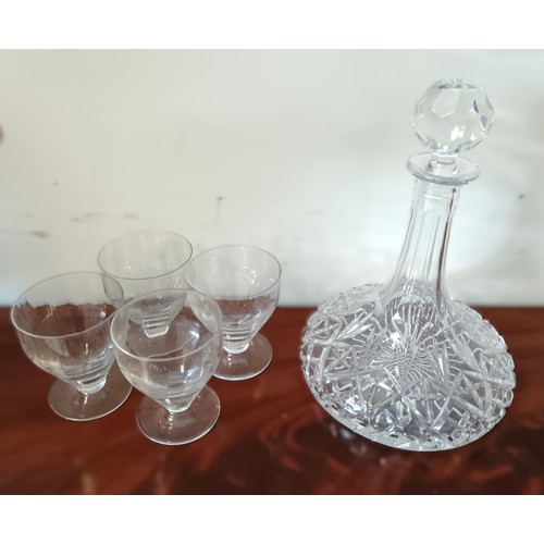 3 - A set of four 19th century glasses, together with a decanter, each with cut detail and faceted decor... 