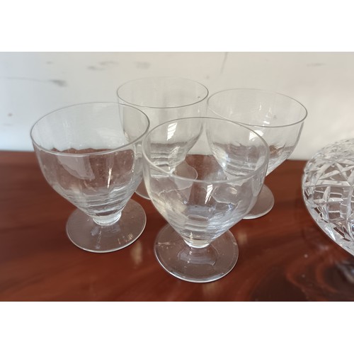 3 - A set of four 19th century glasses, together with a decanter, each with cut detail and faceted decor... 
