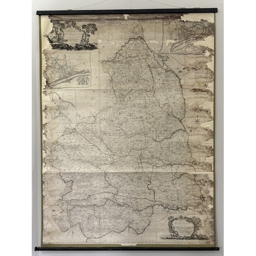 7 - A large map of Northumberland, dated 1769, with detailed topographical engraving and place names, wi... 
