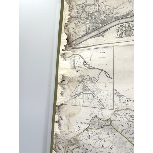 7 - A large map of Northumberland, dated 1769, with detailed topographical engraving and place names, wi... 