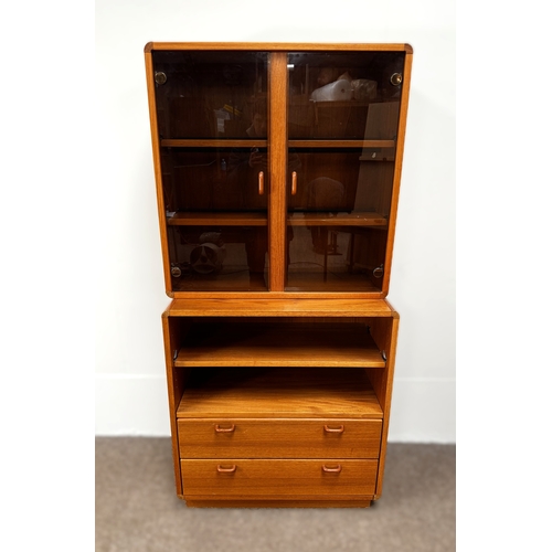 12 - A mid-20th century teak sectional display and storage cabinet, probably G-Plan,181cm high, 86cm dept... 