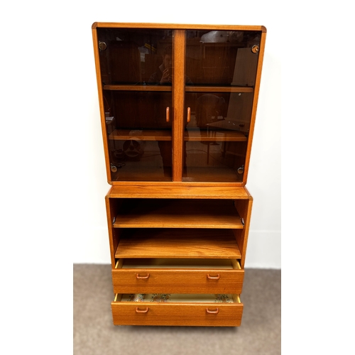 12 - A mid-20th century teak sectional display and storage cabinet, probably G-Plan,181cm high, 86cm dept... 