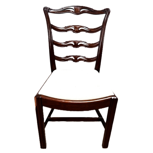 13 - A contemporary cantilever dining chair in faux leather upholstery; also a dining chair with cream fa... 