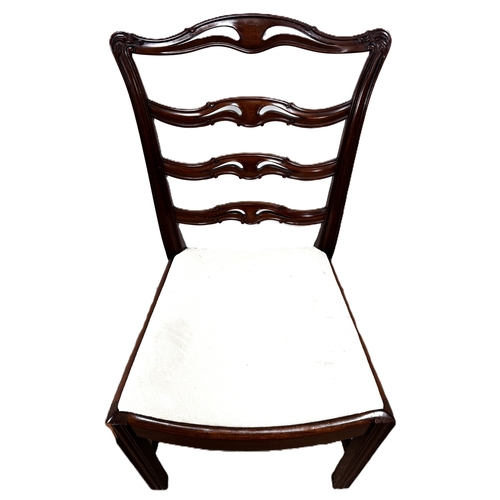 13 - A contemporary cantilever dining chair in faux leather upholstery; also a dining chair with cream fa... 