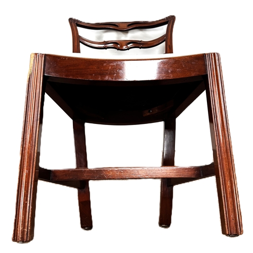 13 - A contemporary cantilever dining chair in faux leather upholstery; also a dining chair with cream fa... 