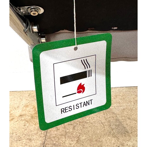 13 - A contemporary cantilever dining chair in faux leather upholstery; also a dining chair with cream fa... 