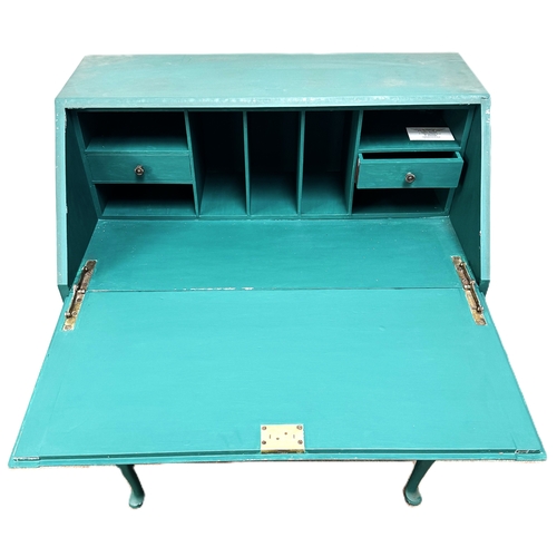 14 - A 1930s bureau,painted green with decorative brassware,W77cm x H103cm x D44cm