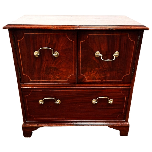 17 - A mahogany inlaid cabinet, with two cabinet doors over a single long drawer,W79cm x H70cm x D37cm... 