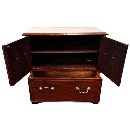 17 - A mahogany inlaid cabinet, with two cabinet doors over a single long drawer,W79cm x H70cm x D37cm... 