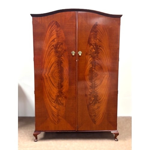 18 - A vintage walnut veneered double wardrobe;191cm high, 121cm width, 55cm depth.