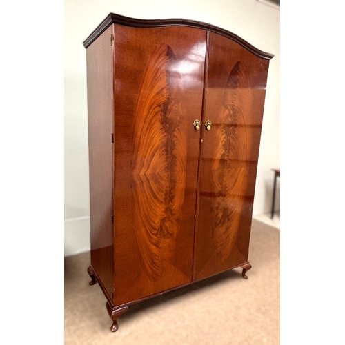 18 - A vintage walnut veneered double wardrobe;191cm high, 121cm width, 55cm depth.